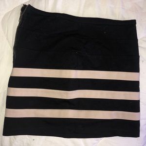 Black mini form fitting skirt with tan stripes